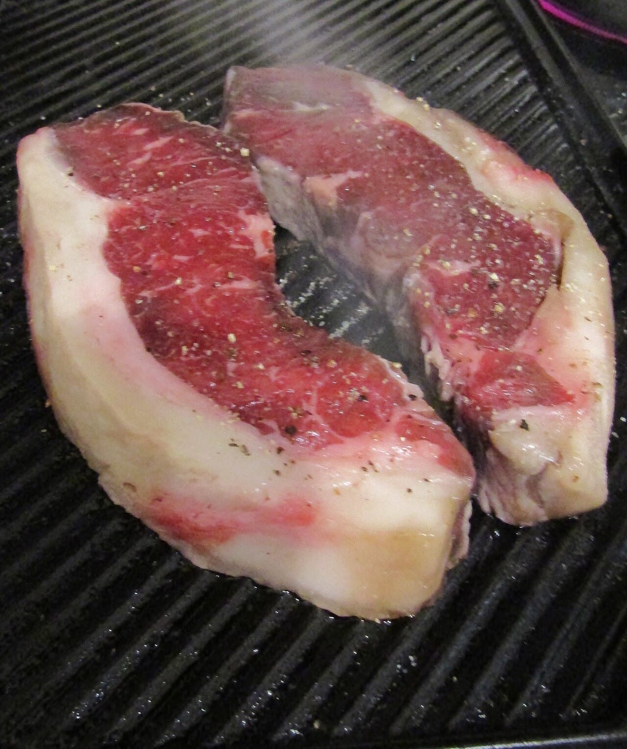 Carne a la brasa en La Taberna del Puerto